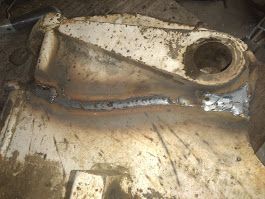 A close up of a piece of metal with a hole in it.