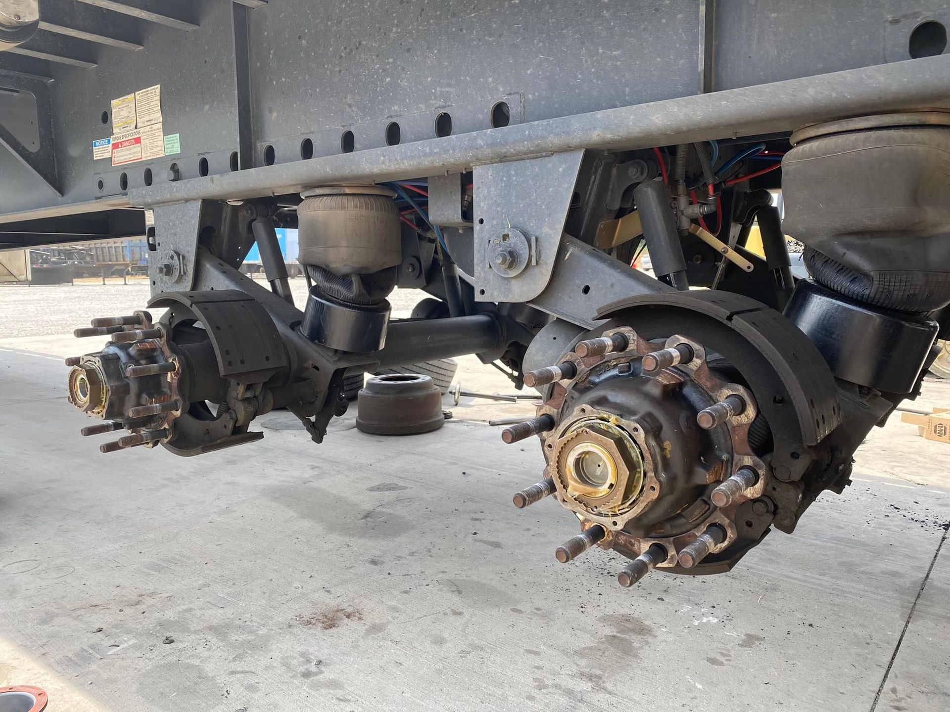 A close up of the rear axle of a truck.