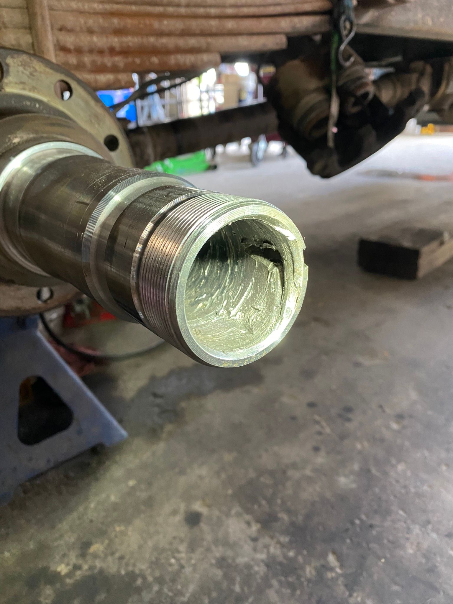 A close up of a metal object with a hole in it.