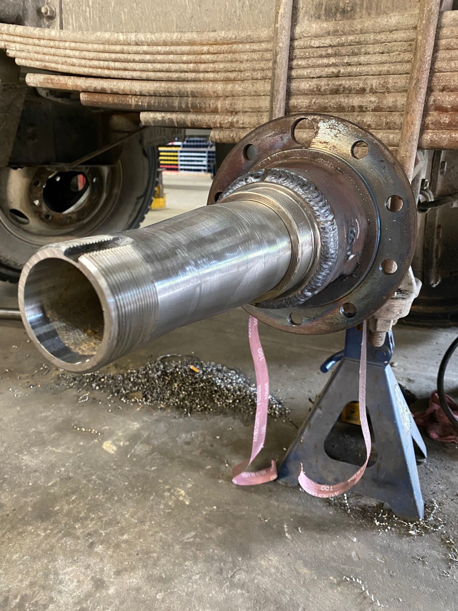 A close up of a metal object with a hole in it.