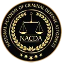 National Academy of Criminal Defense Attorneys seal with scales of justice, laurel, and stars.