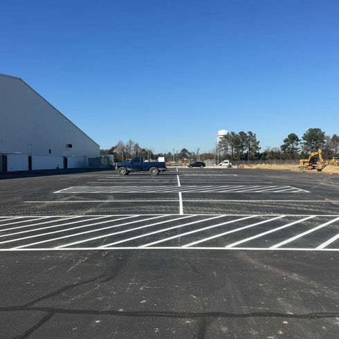 Parking Lot Striping Machine Laying down lines on concrete in huntsville
