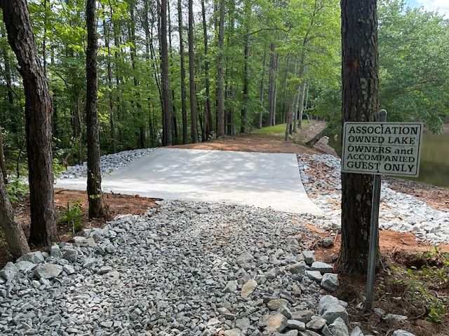 There is a sign that says association owned lakes
