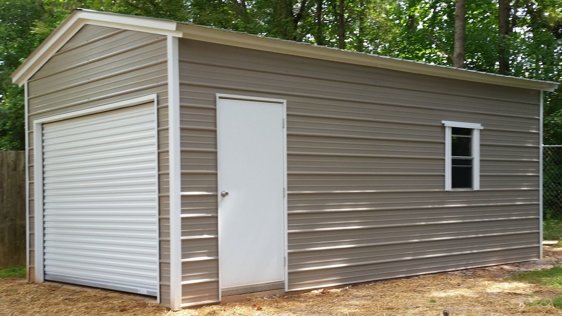 A garage with a white door and a window