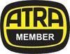 ATRA Member logo: Black and yellow shield with