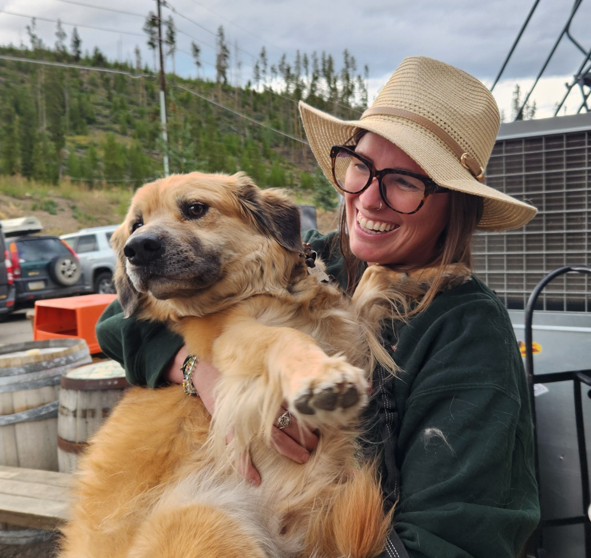 Casey and her dog at ripple and root therapy in colorado