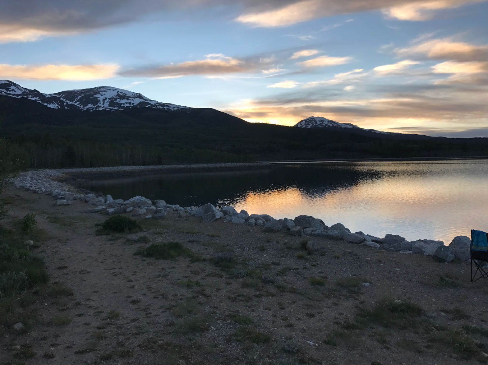 image of a lake and mountains at ripple and root therapy in colorado