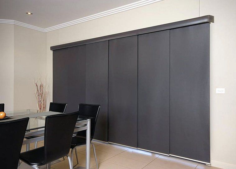 black chair black curtain