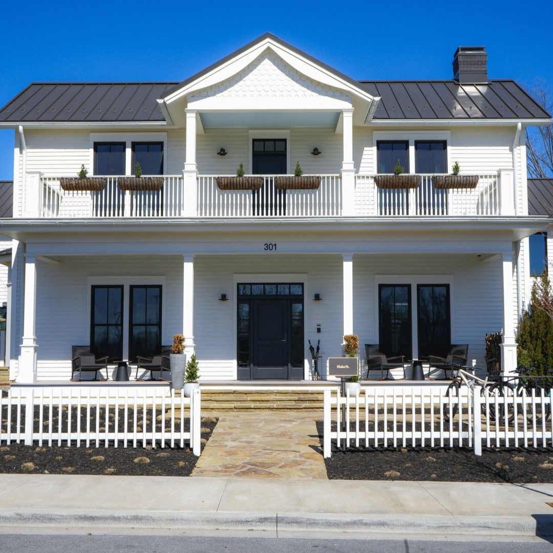 A large white house with the number 31 on the front