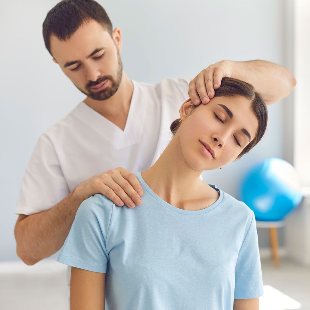 Chiropractor Examining the Neck — Charlotte, NC — Accident & Injury Center