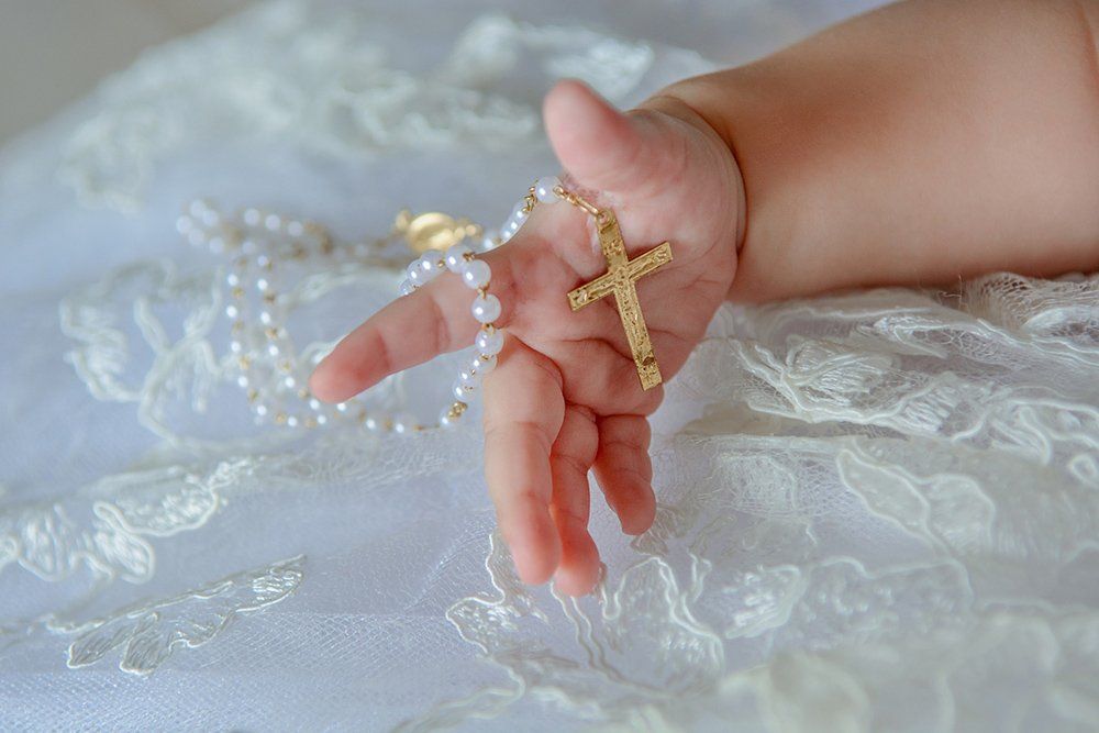 Child's Hand with a Crucifix — Saint John, IN — Boric Religious Gift