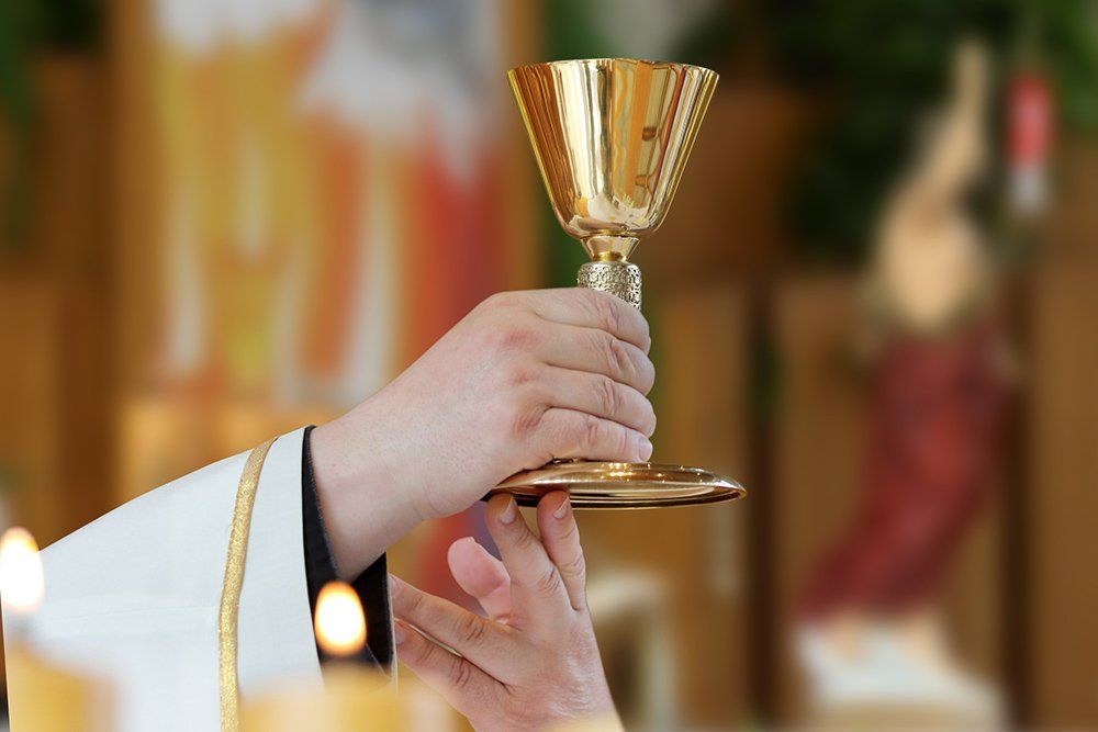Priest Holding Chalice — Saint John, IN — Boric Religious Gift