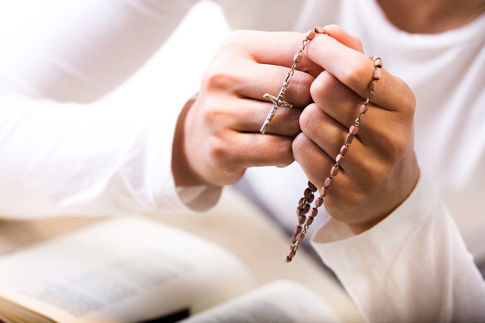 Praying with Rosary — Saint John, IN — Boric Religious Gift