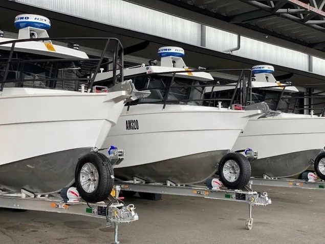 Large Boat is Sitting on Top of a Trailer in a Parking Lot — BME NQ in Portsmith, QLD