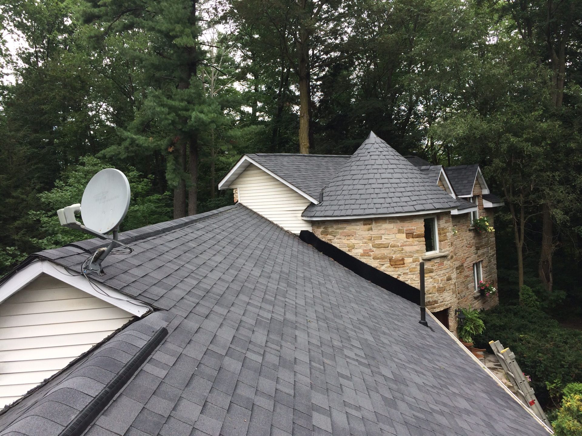 A house with a satellite dish on the roof