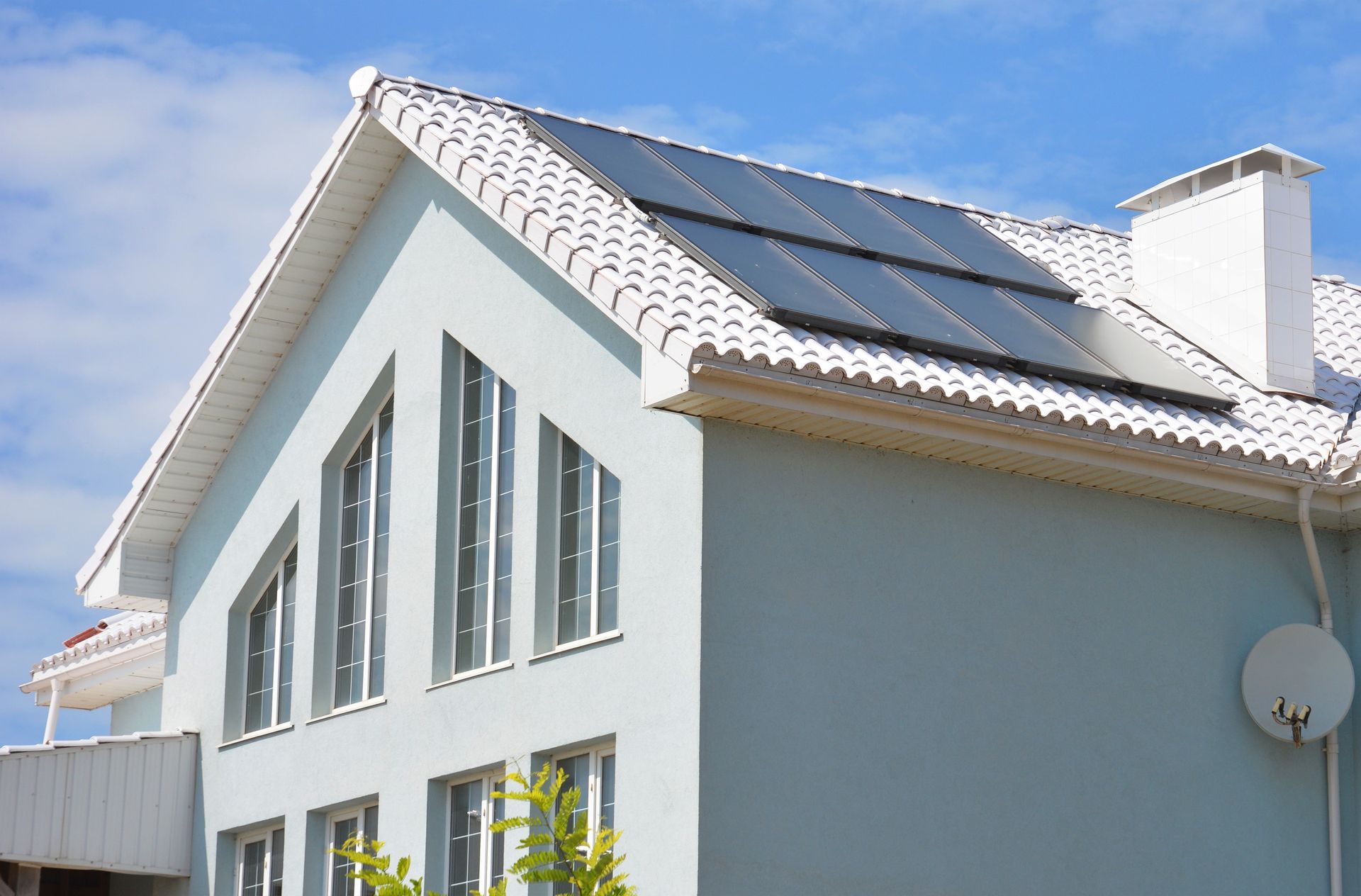 A house with solar panels on the roof.