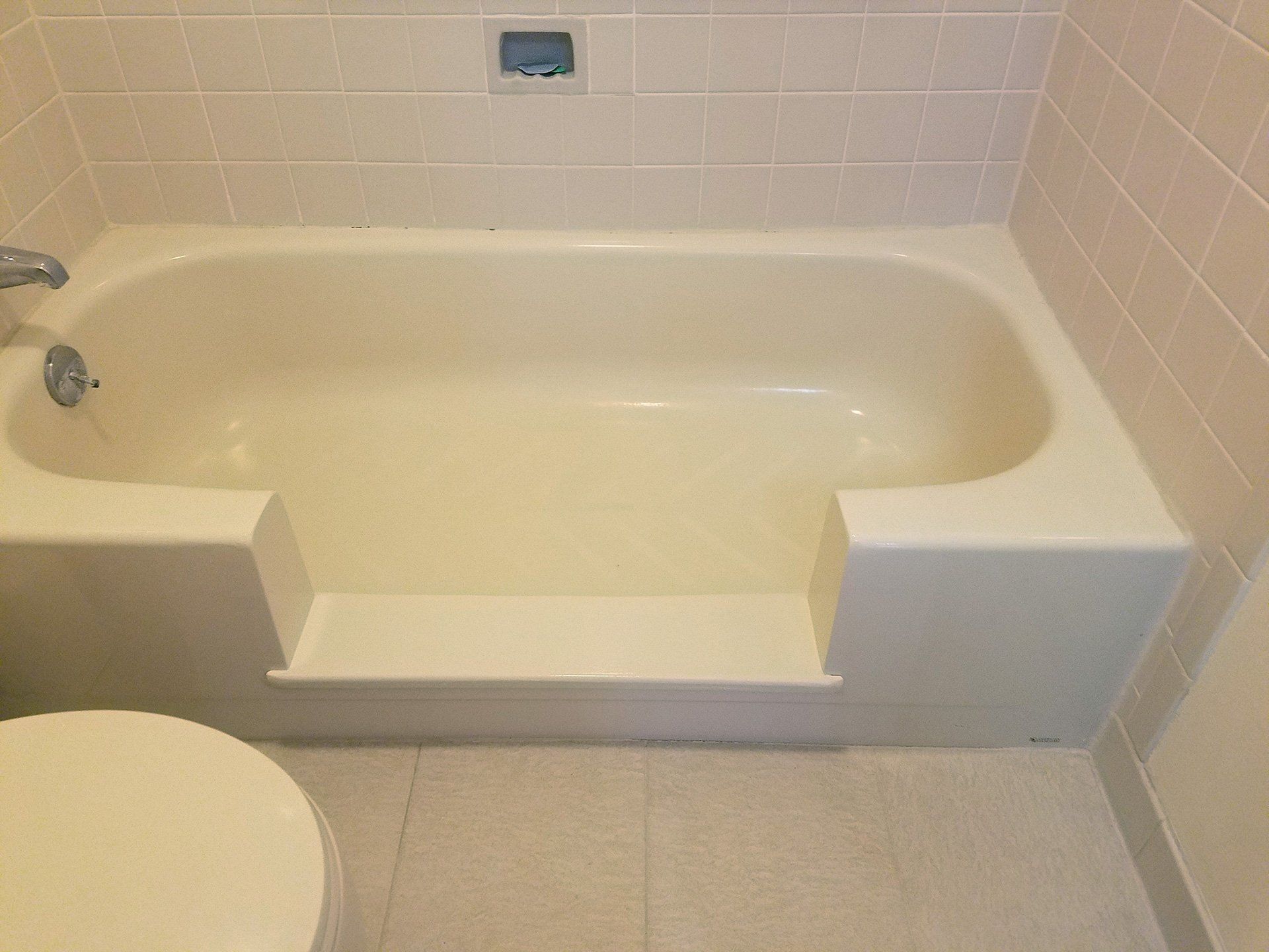 center cut in the bath tub for support