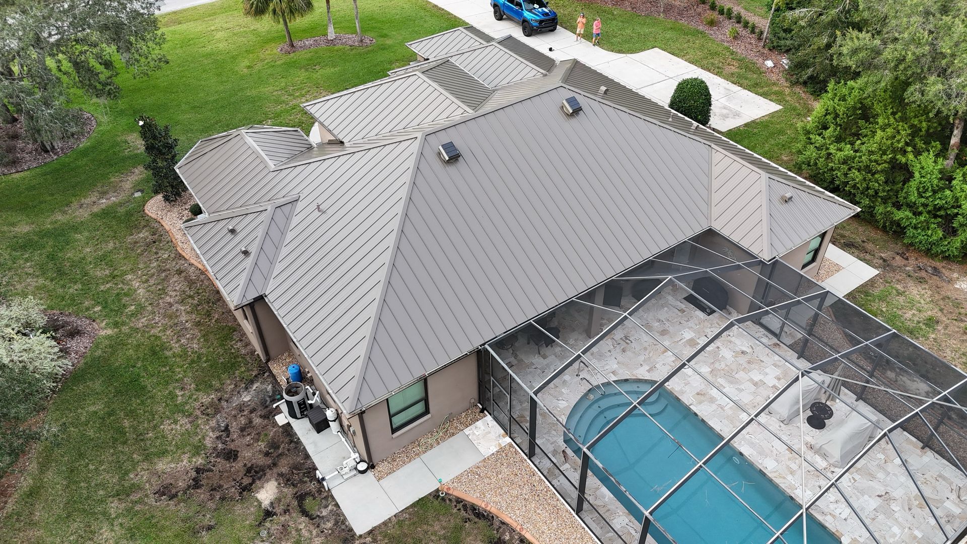 Home with new roof with pool in back