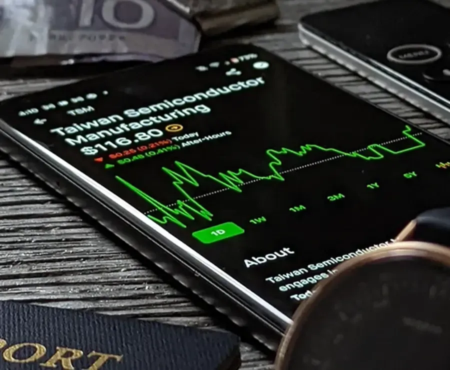 Trading Application Displays Information , American Passport, Misfit Watch, and Money.