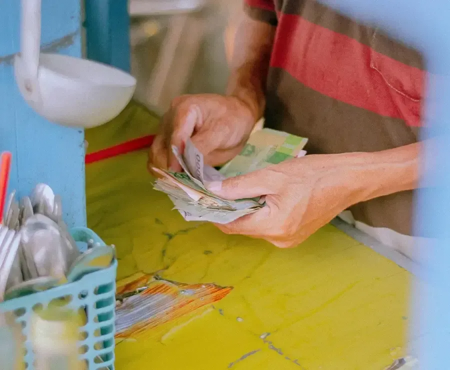 Seller counting his money