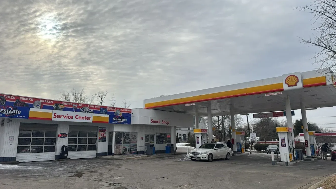 Front Of Auto Shop Beside Gas Station | Best Auto Repairs and Tires 2