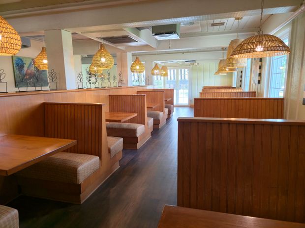 Original Pancake House restaurant exterior with vintage cars.