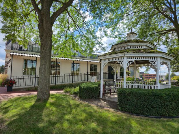 Original Pancake House restaurant exterior with vintage cars.
