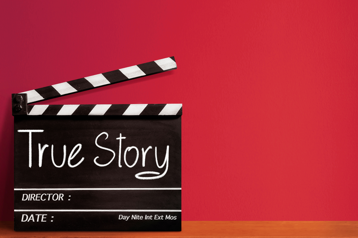 directors slate with true story on a red background