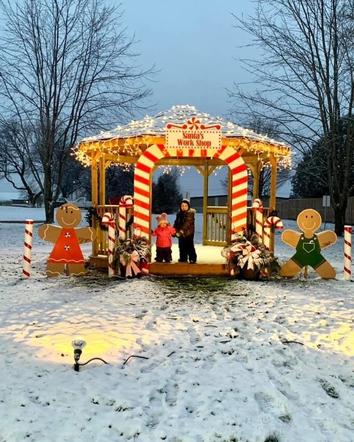 Decorated holiday arch at Clifford Rotary Celebration Square winter event
