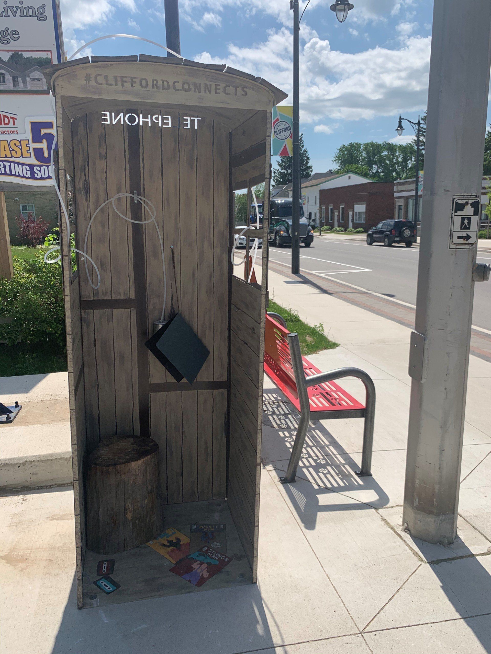 This booth was made for talking” mural – interactive art installation - wooden booth  front