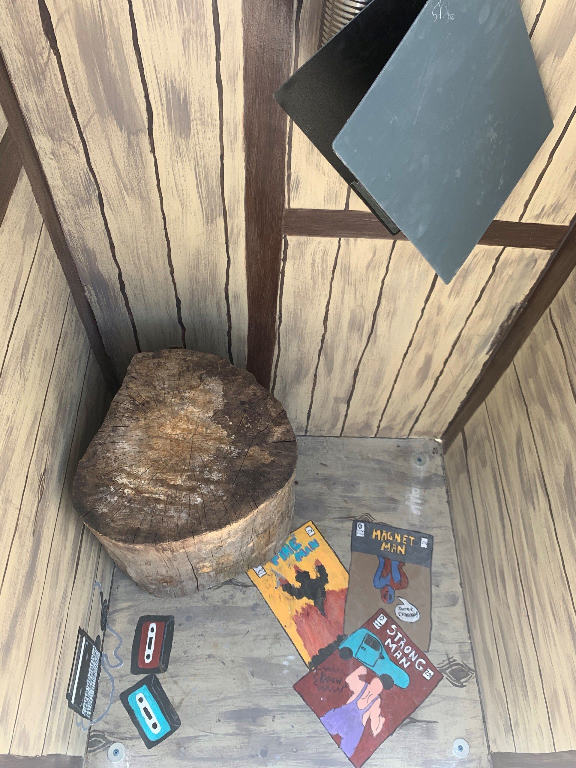 This booth was made for talking” mural – interactive art installation - wooden booth  inside