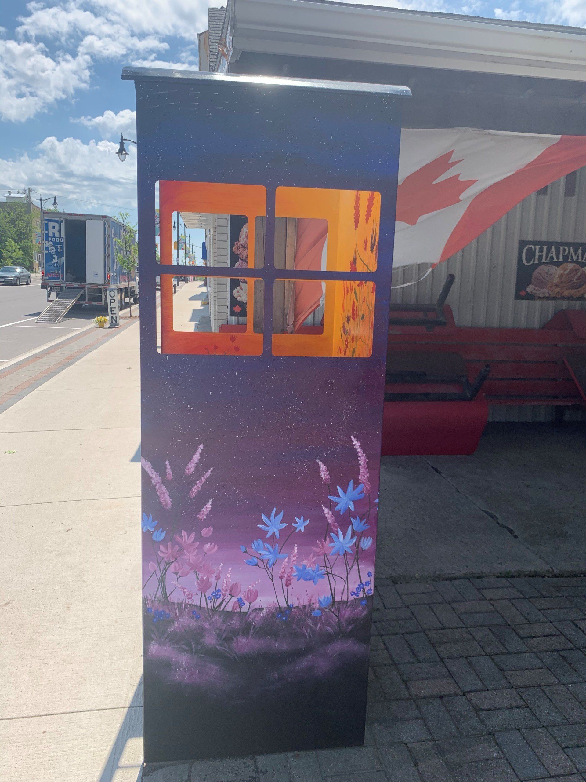 This booth was made for talking” mural – interactive art installation - side profile