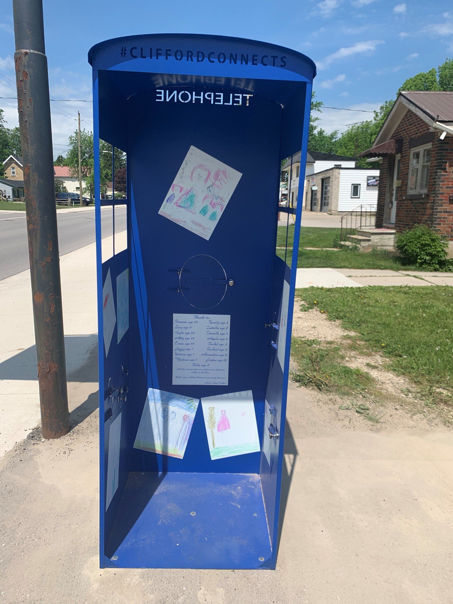 This booth was made for talking” mural – interactive art installation - blue booth front