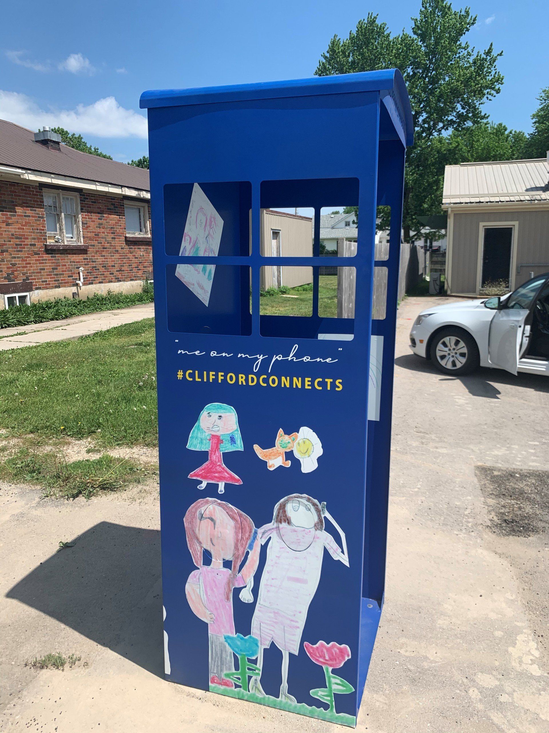 This booth was made for talking” mural – interactive art installation - blue booth side