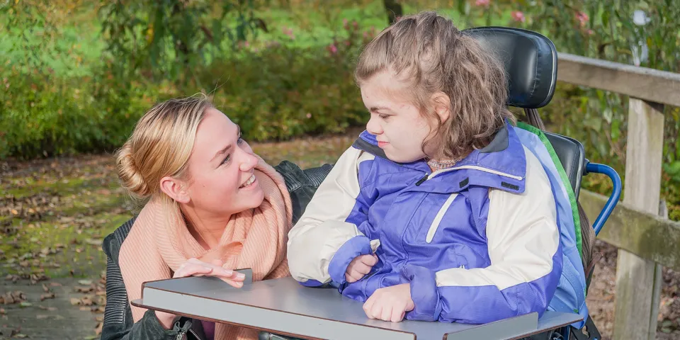 Woman talking to child in wheelchair — Signal Mountain, TN — Trailhead Estate Planning
