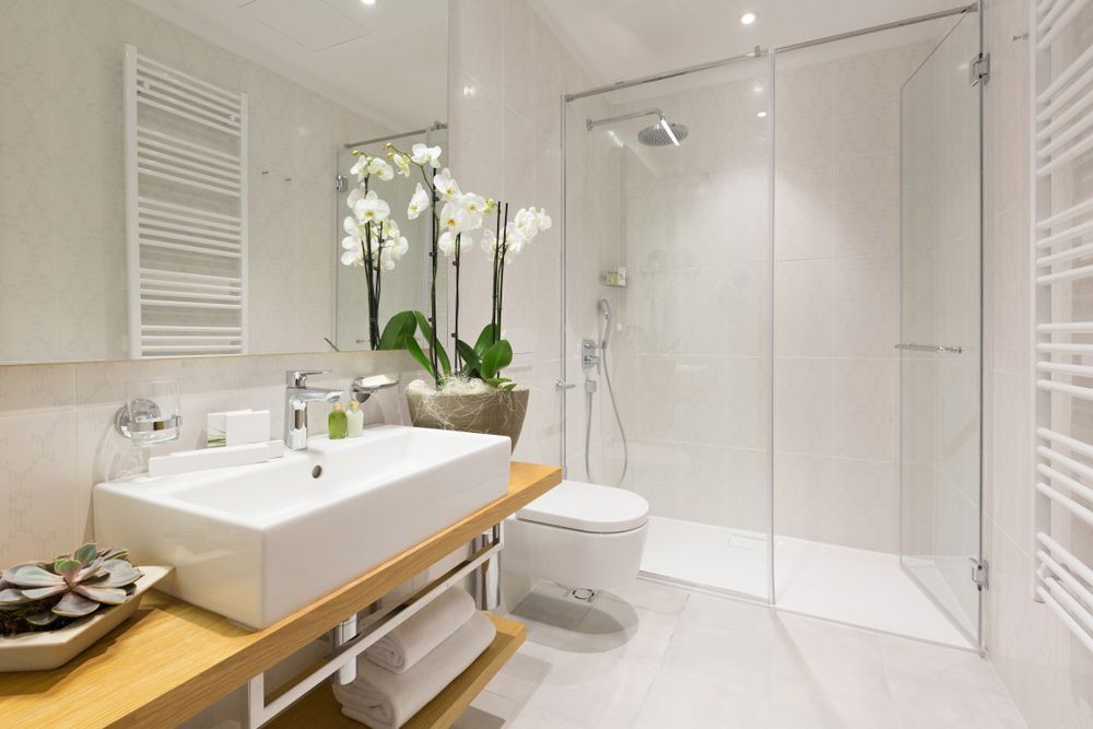 A Bathroom With a Sink, Toilet, and Walk in Shower — Headlands Glass in Mullumbimby, NSW