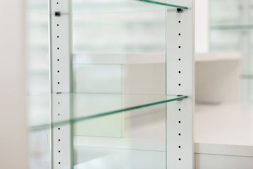 White Cabinet with Glass Shelves and Adjustable Shelf Supports