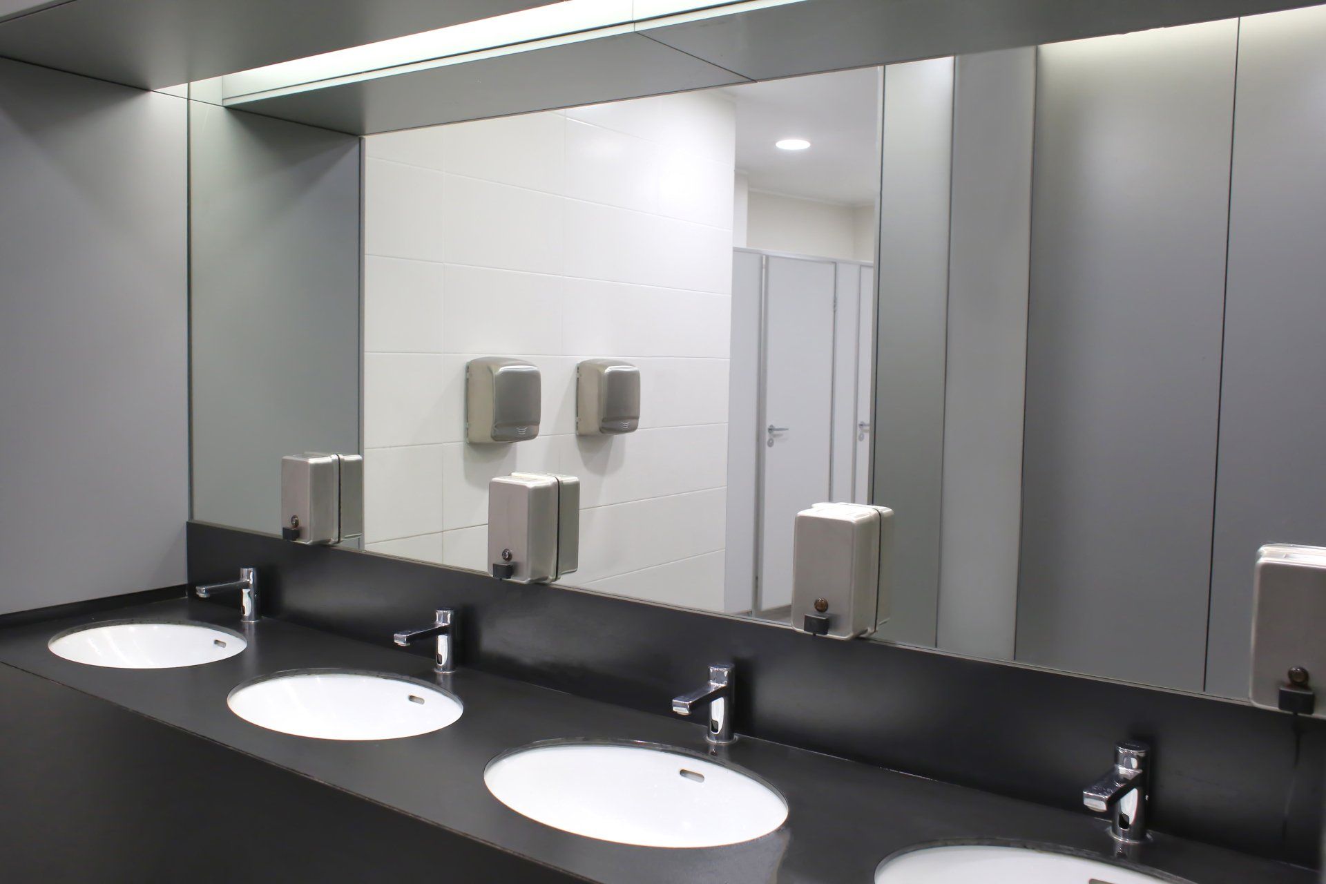 Bathroom Mirror in Commercial Building — Headlands Glass in Ballina, NSW