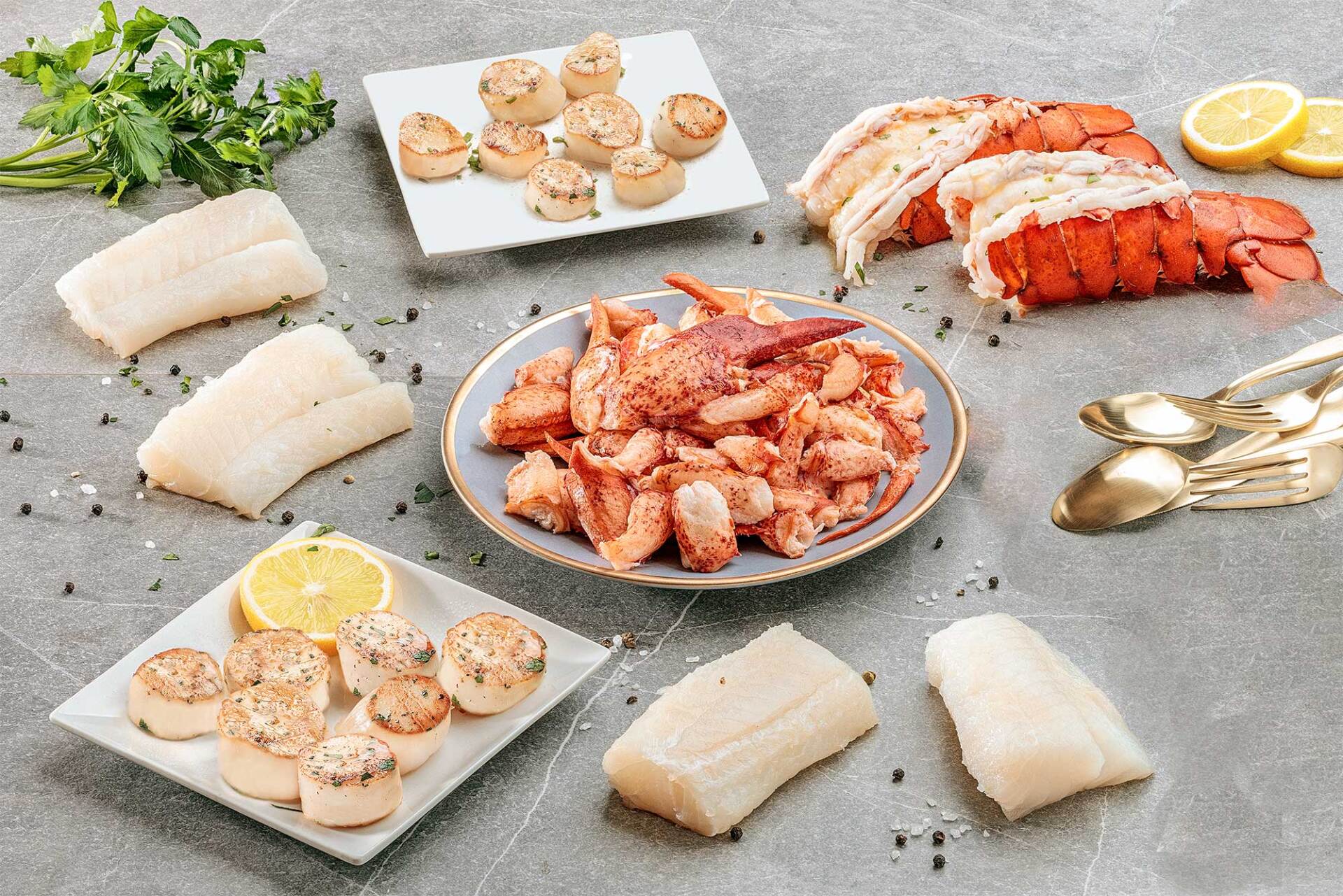 There are many different types of seafood on the table.