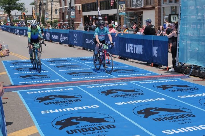 A person is riding a bike in a race.