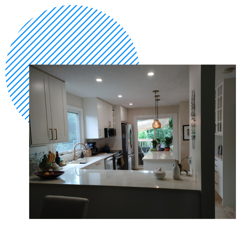 A person is typing on a laptop computer with a board on the screen.