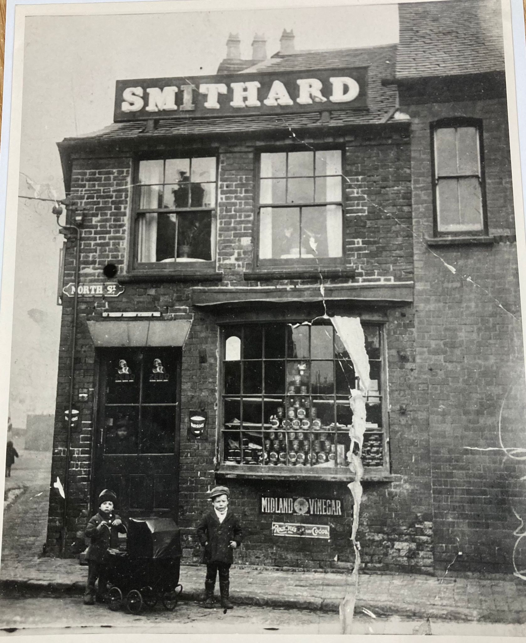 A black and white photo of a smithard store