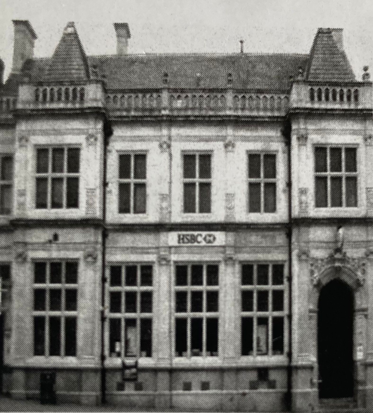 A black and white photo of a hsbc building