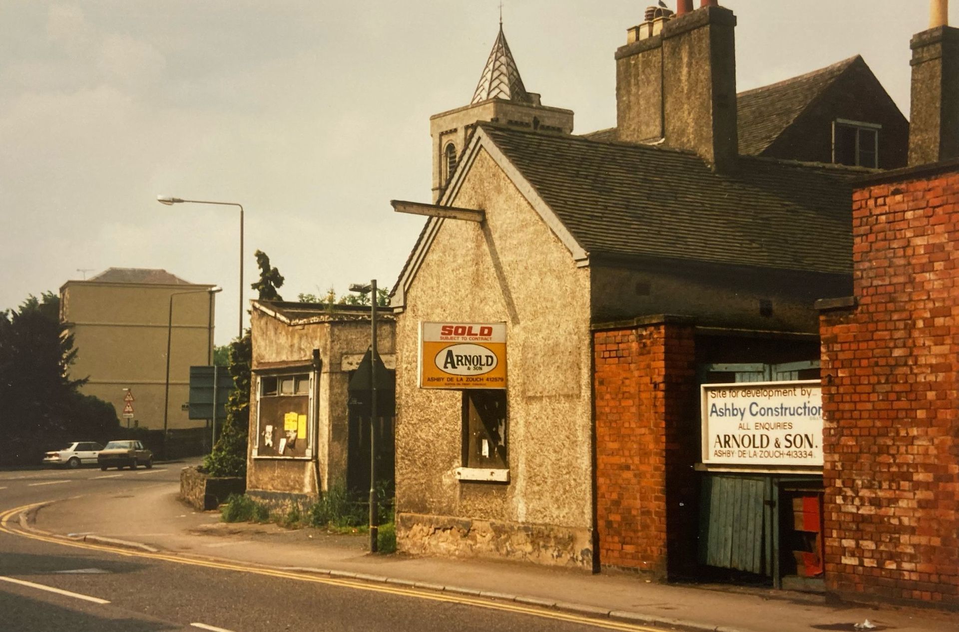 A building with a sign that says james on it