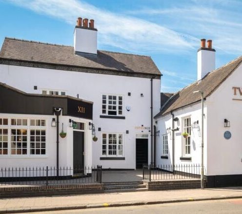 A white building with the number 11 on it