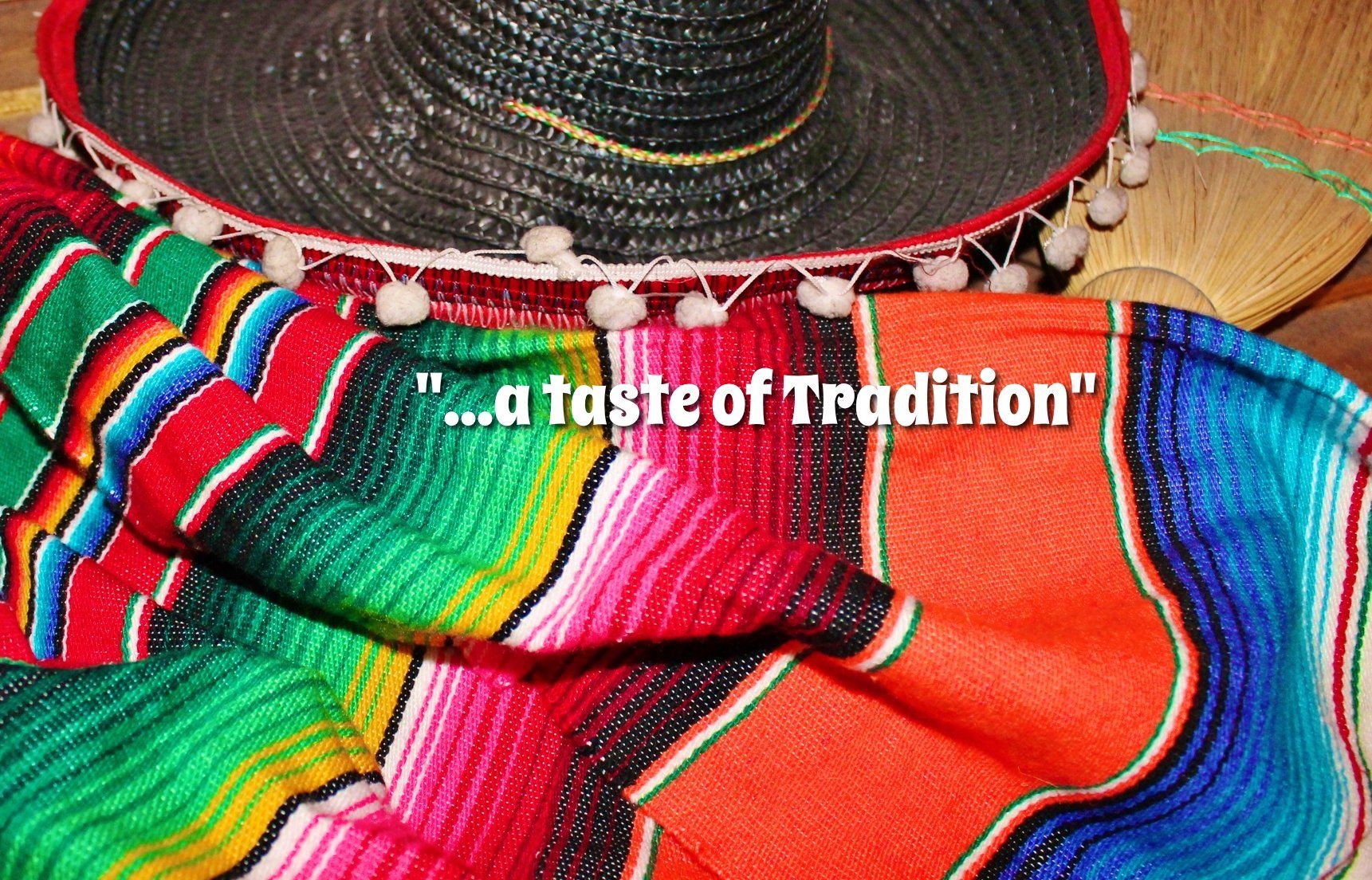Sombrero and colorful serape with 