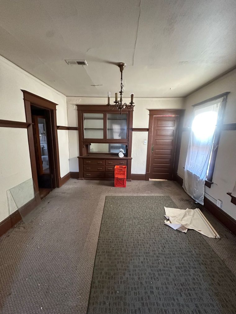 There is a red crate in the middle of the room.