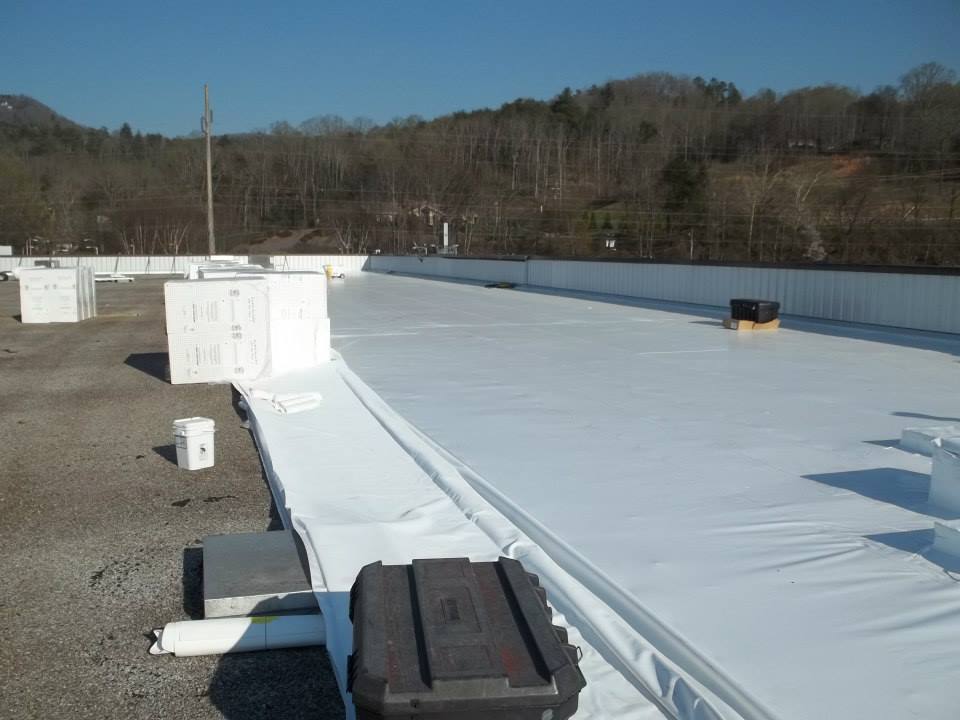 Commercial Flat Roof During Roof Coating — Candler, NC — ARS Construction Service
