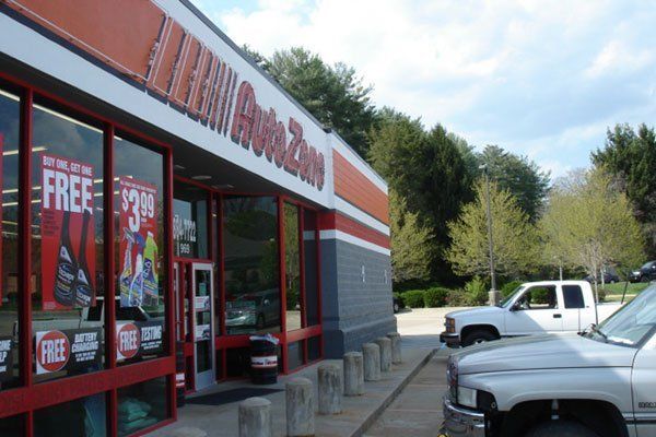 Auto Shop With Cars Parking Outside— Candler, NC — ARS Construction Service