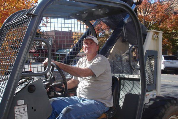 Man Driving A Car — Candler, NC — ARS Construction Service